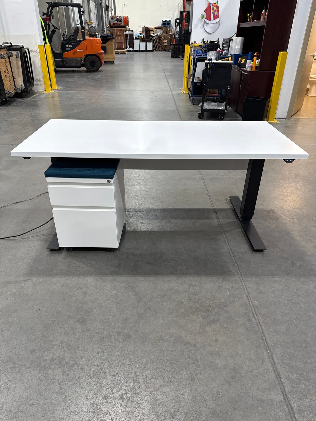 5’ Haworth Electronic Sit Stand Desk w/Modesty Panel and BF Ped