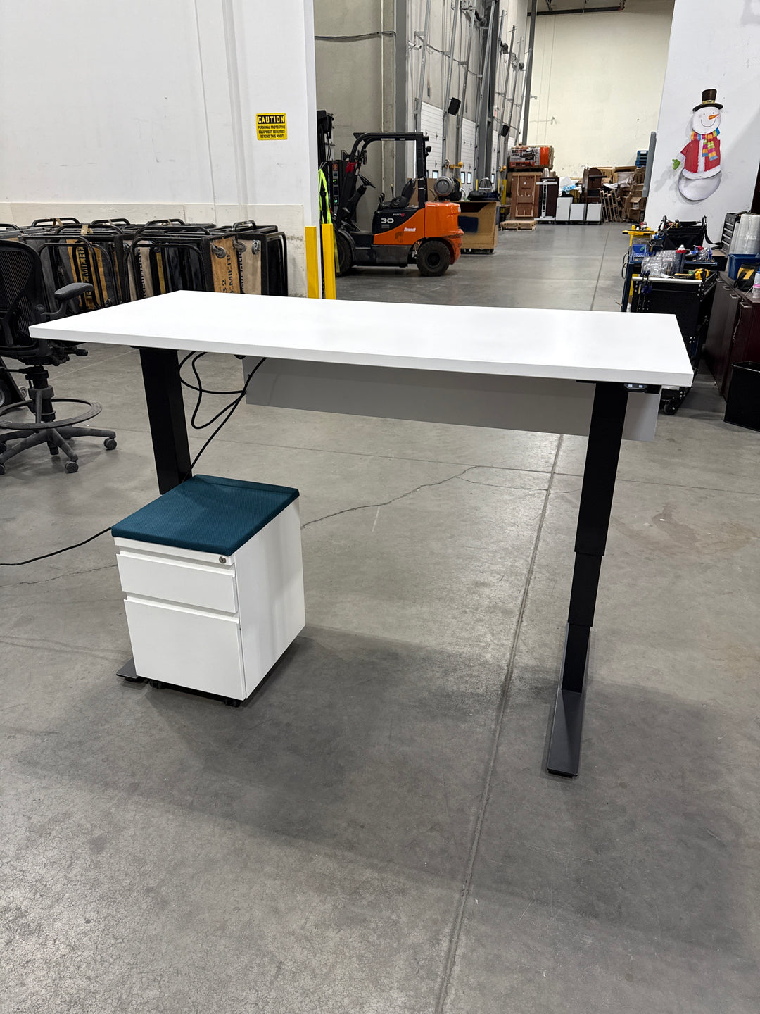 5’ Haworth Electronic Sit Stand Desk w/Modesty Panel and BF Ped